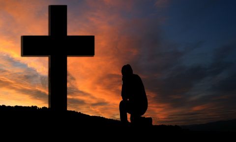 Kneeling at the cross