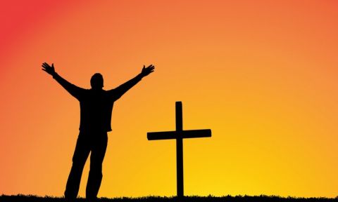 silhouette of a man in front of a cross1